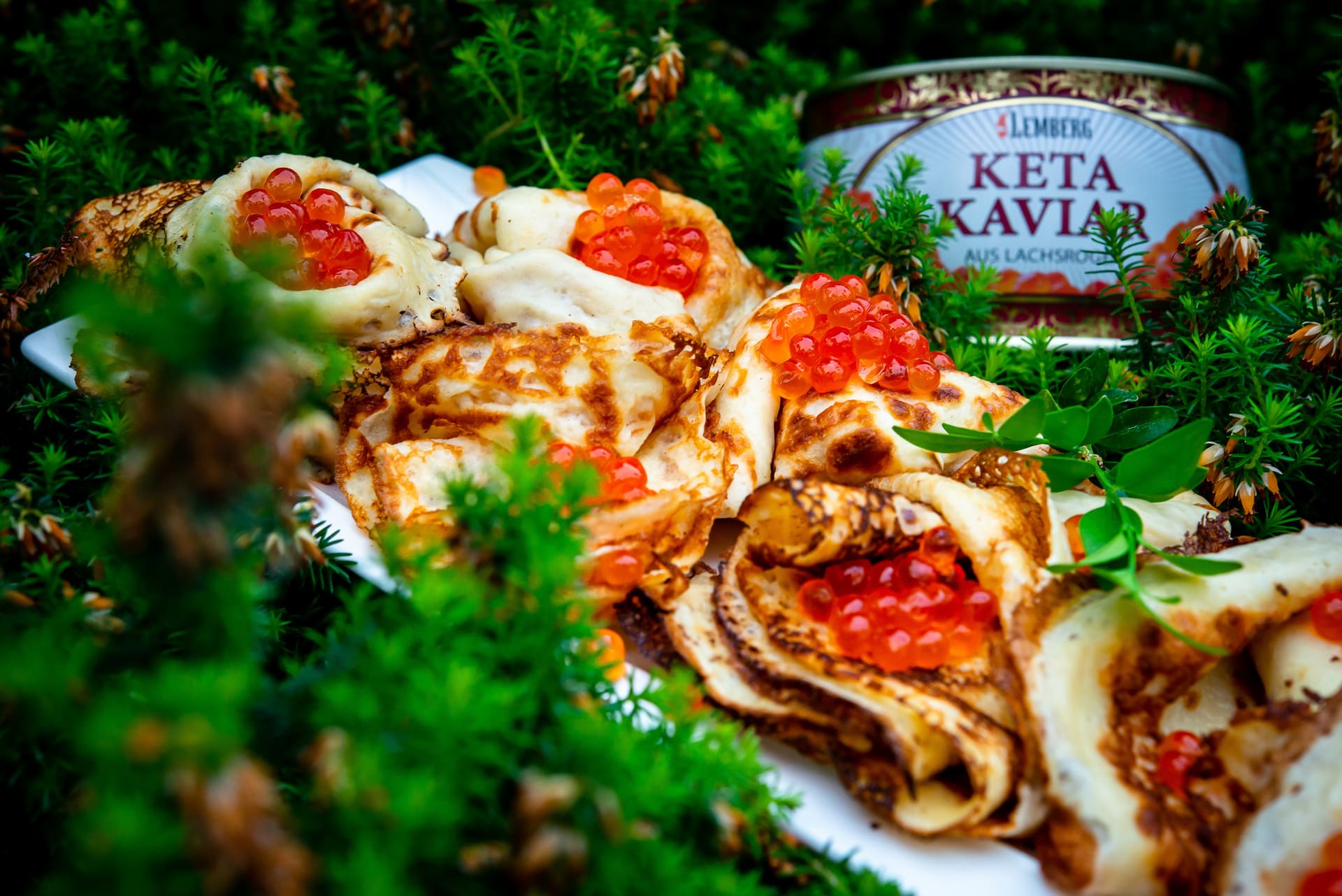 Delicate pancakes with red and black caviar – what could be tastier